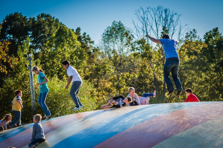 Kids bouncing on the Hilltop Hopper